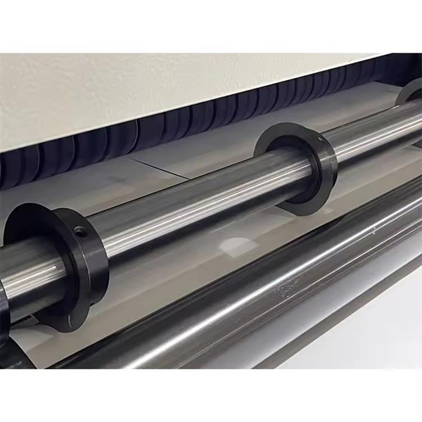 Self-adhesive film roll to sheet slitting machine